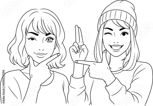Two stylish young women sharing a playful moment, striking poses with a wink and a smile.