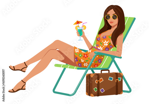 Relaxed woman with cocktail enjoys summer vacation lounging in chair beside vintage suitcase, perfect for travel and leisure themes.