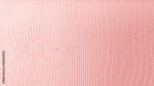Rose gold silk fabric texture with smooth folds and shiny surface, elegant luxury background for design and decoration.