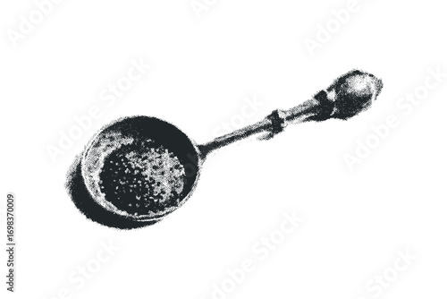 Antique metal spoon filled with granular substance isolated on white