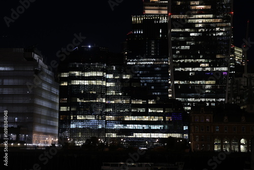 Financial District Office Buildings at Night with Illuminated Windows