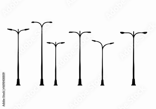 Silhouettes of various modern street lights and urban lamp posts, offering a versatile collection for architectural and city planning design elements on a white background.
