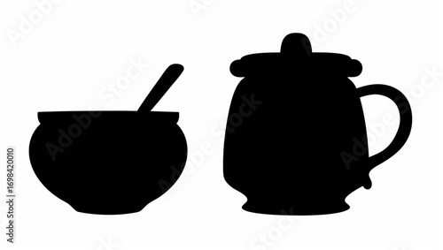 Silhouette of a sugar bowl with a spoon and a covered creamer pitcher on a white isolated background