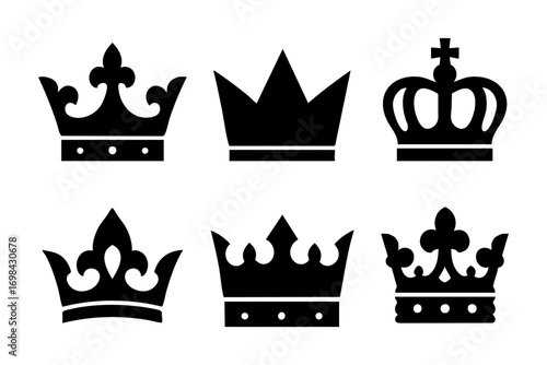 Crowns icons: royal crown silhouettes in minimal solid style