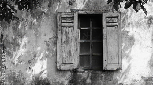 Vintage Wall with Open Wooden Window and Tree Shadows in Black and White Photography