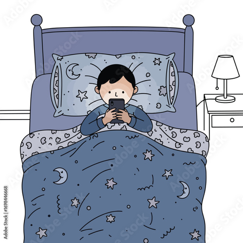 A young boy lies in bed under a blue blanket with moon and star patterns, engrossed in his smartphone at night.