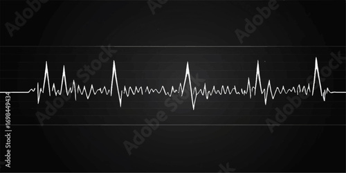 EKG with a red heart and a healthy pulse line on a medical monitor