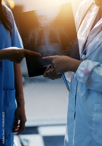 Medical Team Using Digital Tablet for Healthcare, Doctor Technology, X-Ray Analysis.
