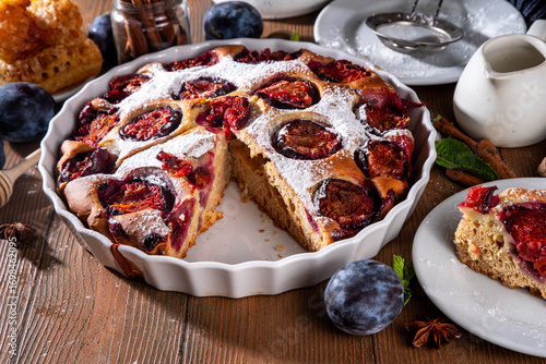 Fototapeta Naklejka Na Ścianę i Meble -  Autumn new york plum pie, tasty cinnamon spices plum torte cake