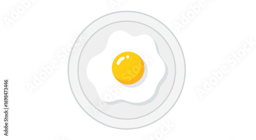 Perfectly Cooked Fried Egg with Bright Yellow Yolk on a White Plate.