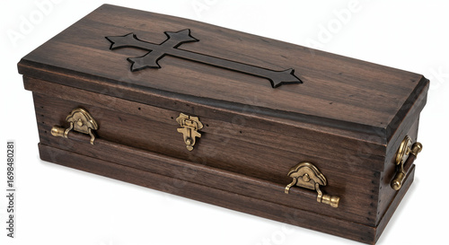 A miniature wooden coffin, crafted from dark brown wood, featuring a black cross on the lid and brass-colored latches and handles, is placed on a white background.