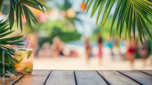 A refreshing cocktail sits on a wooden table, surrounded by tropical greenery, as the vibrant beach scene unfolds in the background, inviting relaxation and enjoyment.