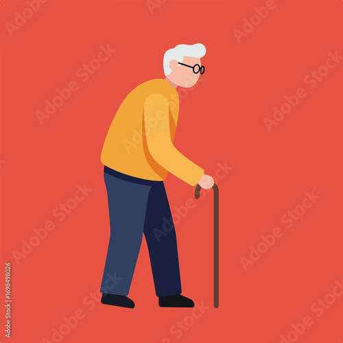 Elderly man walks with cane