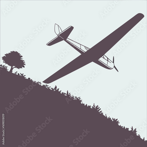 a glider soaring above a hillside with a lone tree