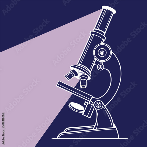 a microscope illuminated by light in a dark setting
