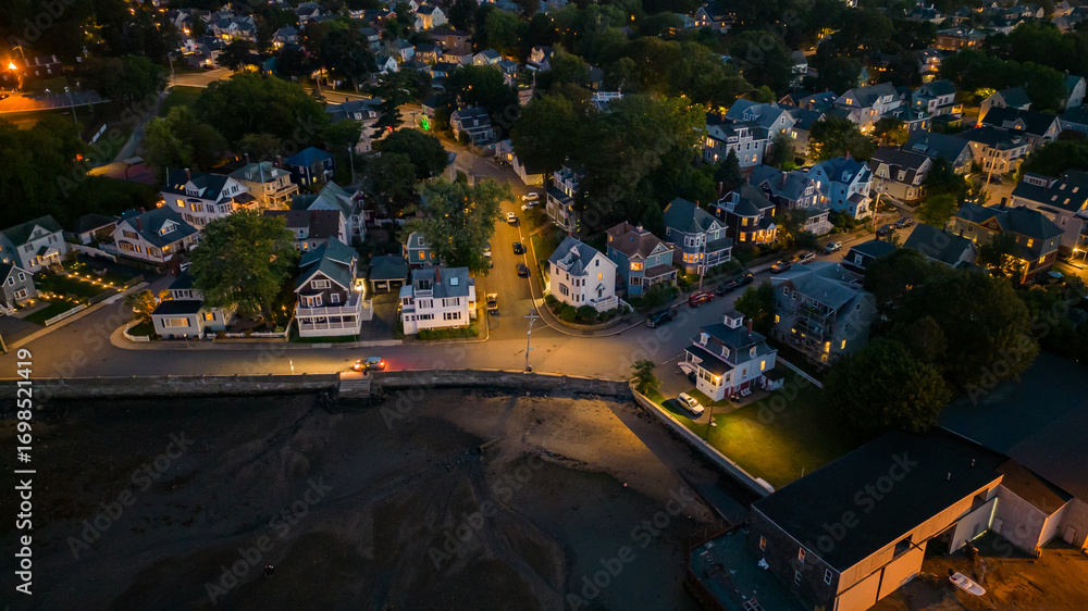 Fototapeta premium view of salem massachusetts at night from aerial drone 