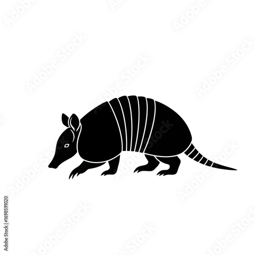Armadillo silhouette walking isolated on white background
