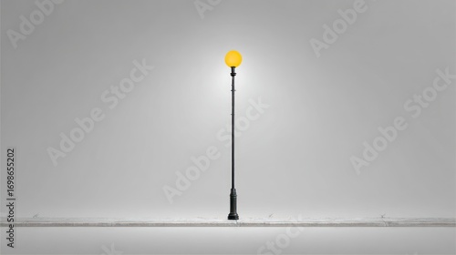 Single street lamp against gray background