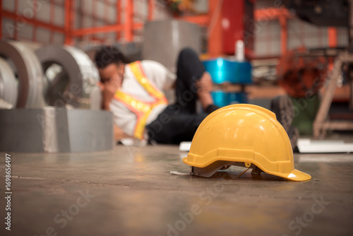 Industrial worker suffered a leg injury while lifting steel used for production on a factory production line