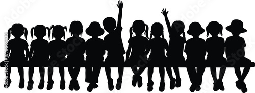 Silhouette of diverse group of happy children sitting together in a row on a bench celebrating childhood friendship and unity