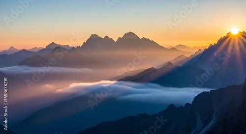 Majestic Sunrise Over Misty Mountain Peaks