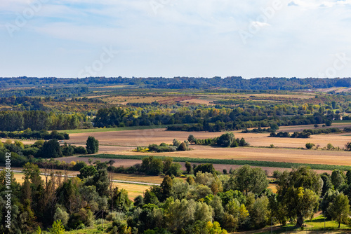 Wallpaper Mural Rolling valley landscape with fields, forests and distant hills Torontodigital.ca