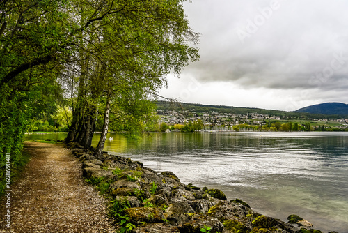 Colombier, Neuenburgersee, Seeufer, Uferweg, Strand, Hafen, Wassersport, Wasservögel, Naturschutz, Auvernier, Neuenburg, Seerundfahrt, Frühling, Schweiz