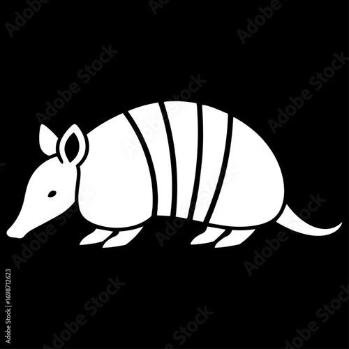 Black silhouette of an armadillo, flat design.
