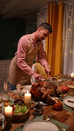Man carving thanksgiving turkey for family dinner