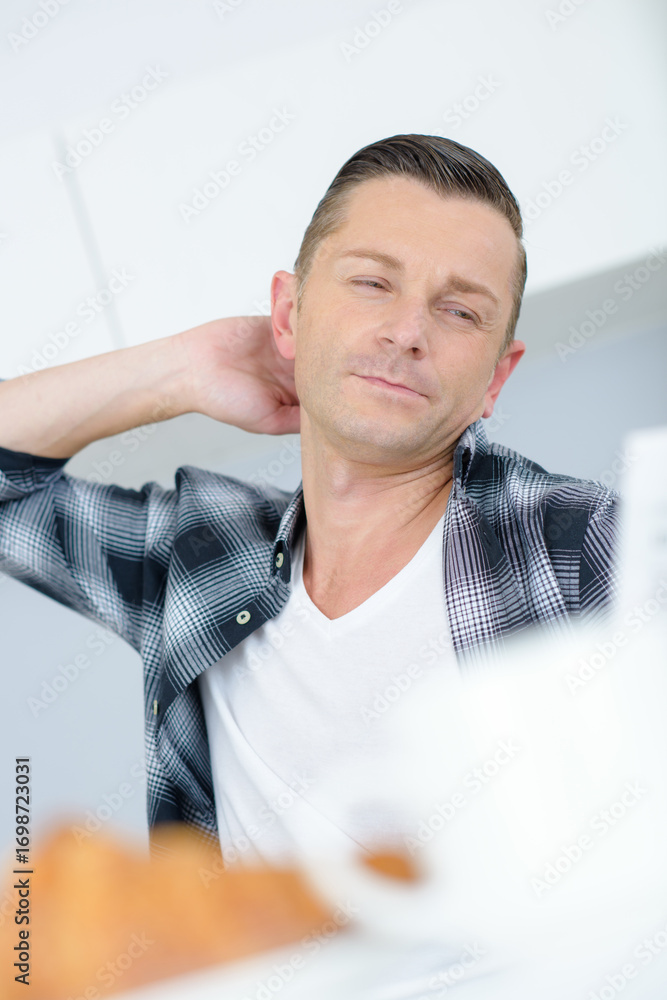 Fototapeta premium a man is relaxing at home