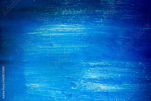 Blue paint grunge wall texture abstract white pattern cold background spot light backdrop vignette