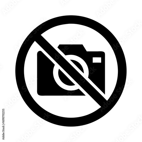 Black camera icon with a diagonal line through it inside a black circle indicating photography is prohibited
