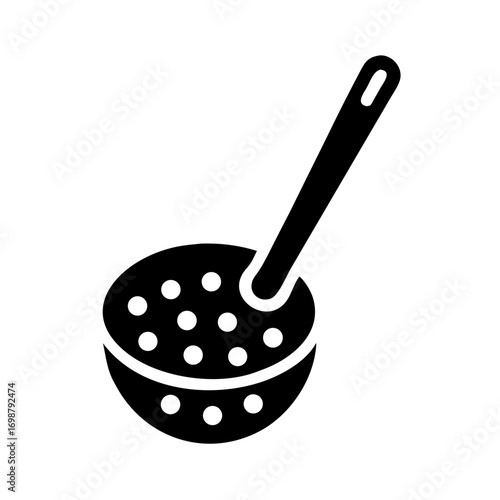 A black skimmer with a long handle and several holes used for cooking and food preparation tasks only