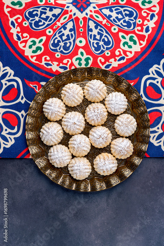 Arabic cuisine. Date stuffed semolina cookies . Maamoul with dates, pistachio or walnuts . Traditional middle eastern sweets for celebration Eid Al- Fitr after Ramadan