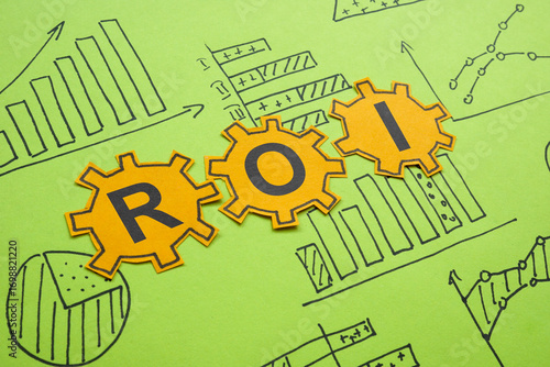 ROI Return on Investment abbreviation and charts. Financial performance.