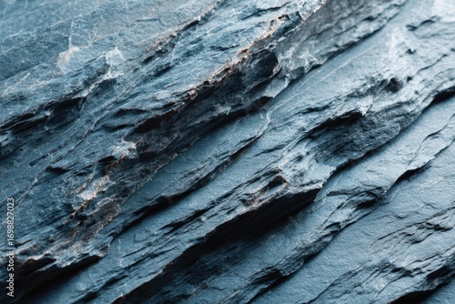 Textured layered slate stone background
