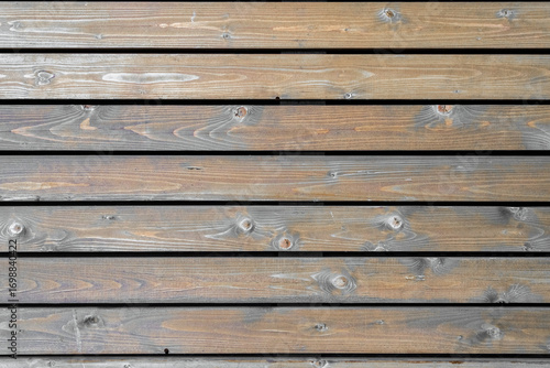 Wallpaper Mural Texture from wooden boards with knots in weathered natural color. Aged background. Closeup. Torontodigital.ca