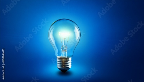 glowing light bulb on a blue background