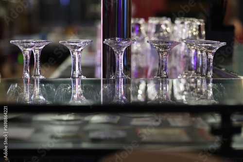 inverted glasses on the bar counter