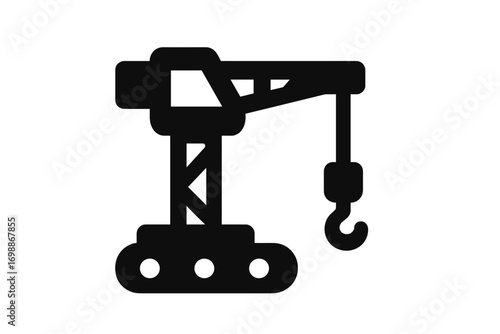 Crane working on a construction site during daylight in a bustling urban environment