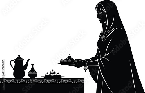 Traditional Indian woman offering sweets at decorated table during festival or ceremony, symbolizing hospitality, culture, celebration, and ethnic traditions.