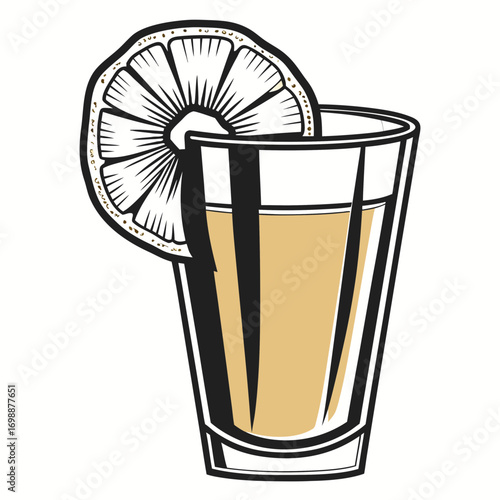 Glass of pineapple juice with a lemon slice on the rim  