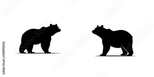A powerful and striking silhouette of a bear, standing tall and facing forward, evokes a sense of strength, wilderness, and primal power, and is referred to as the Majestic Bear Silhouette