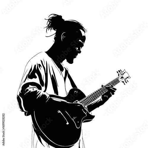 Guitarist in Silhouette: A captivating silhouette of a musician immersed in the artistry of playing a guitar. Capturing the essence of musical performance.