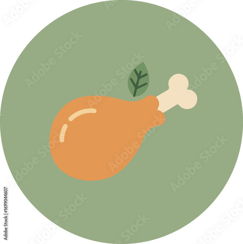Single roasted chicken drumstick with green leaf on muted green background