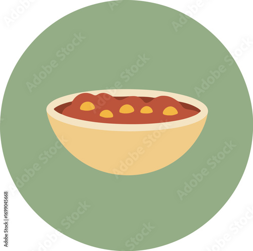White bowl with reddish-brown sauce and yellow garnishes on a green background