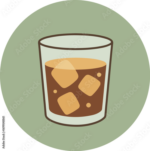 Close-up of a glass with dark iced beverage and square ice cubes on a green background