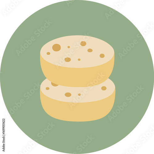 Two stacked doughnuts with chocolate chips on a green background