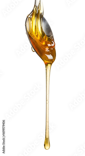 Honey dripping from spoon isolated on white background
