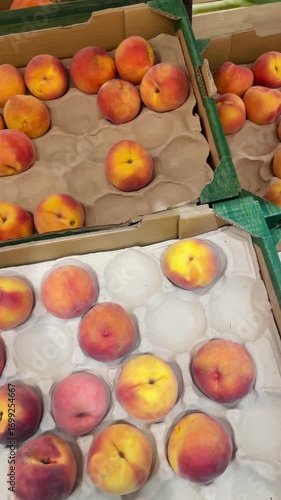  Peaches. Fruits on a store counter. Healthy nutrition and consumer choice in everyday life.